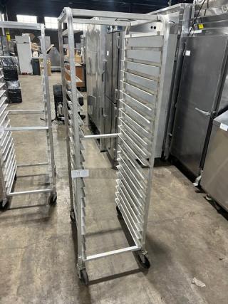 Commercial aluminum full-height bun/sheet pan rack on casters, excellent condition, 20 slots. Ideal for bakery use.