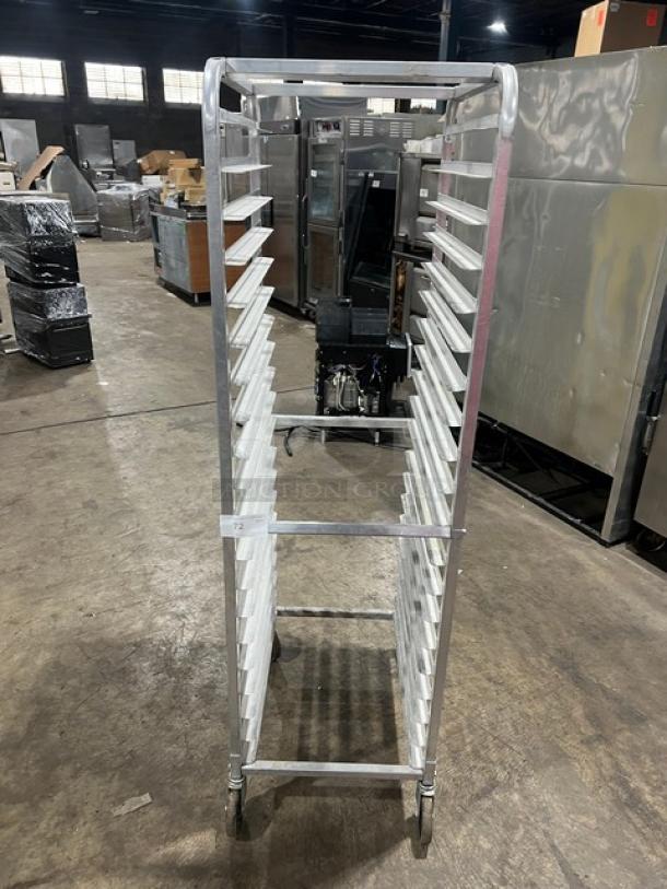 Commercial aluminum full-height bun/sheet pan rack on casters, excellent condition. 20 slots, durable, ideal for kitchens.
