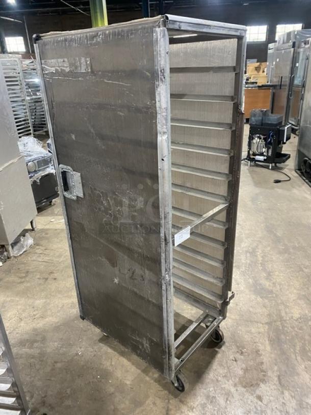 Commercial aluminum full-height bun/sheet pan rack with corrugated sidewalls, on casters, used condition.