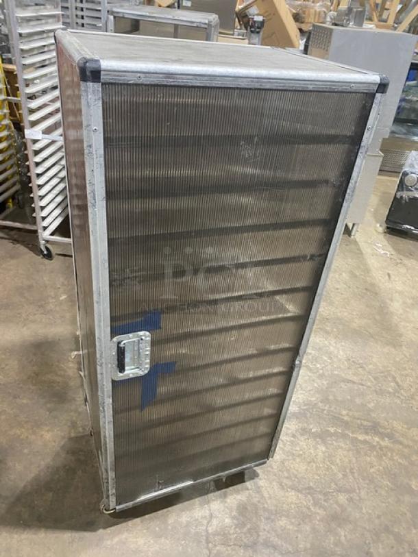 Commercial aluminum full-height bun/sheet pan rack with corrugated sidewalls, on casters, used condition.