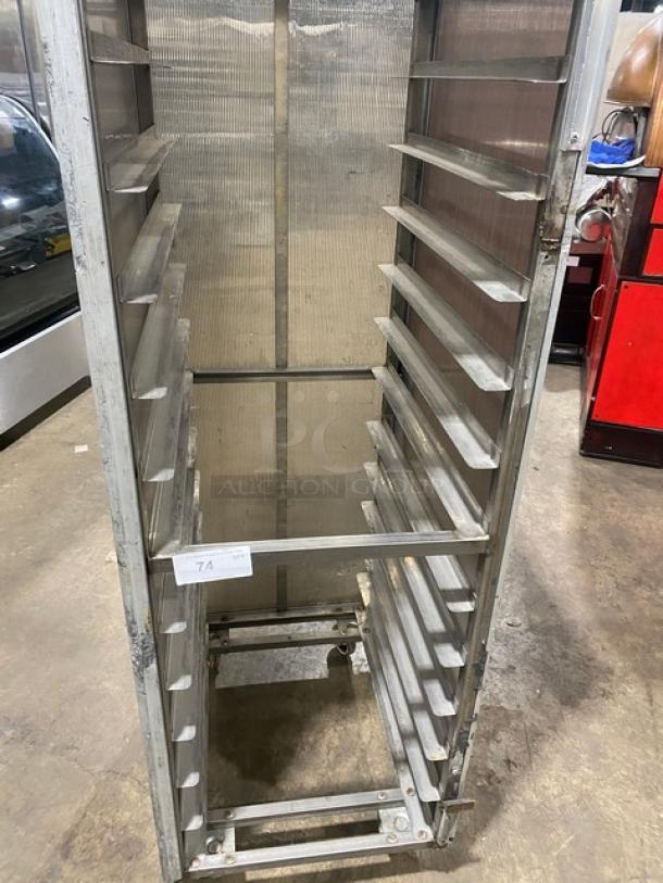 Commercial aluminum full-height bun/sheet pan rack with corrugated sidewalls, on casters, used condition.