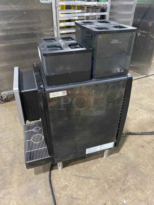 Franke FCS4050 black electric countertop coffee machine with touch screen, drip tray, and legs. Model SN: 3400000072792.