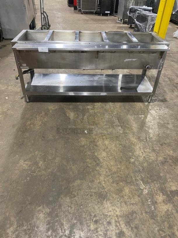 Duke Aerohot 5-well stainless steel gas steam table, single undershelf, on legs; ideal for commercial use.