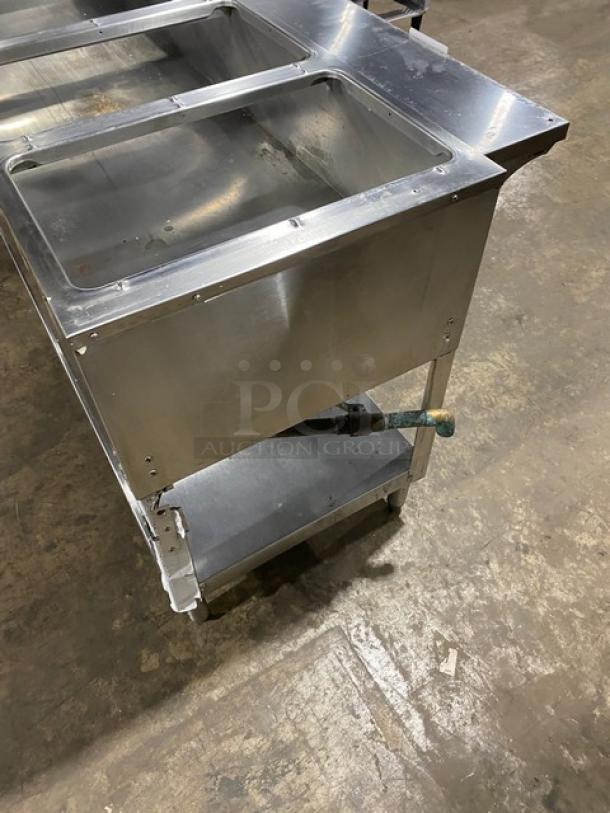 Duke Aerohot Series stainless steel gas-powered 5-well hot food/steam table with single undershelf on legs, used condition.