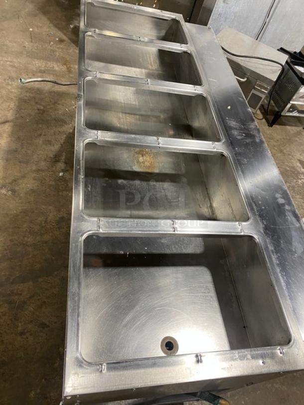 Duke Aerohot Series 5-well stainless steel gas steam table, single undershelf, good condition, on legs.
