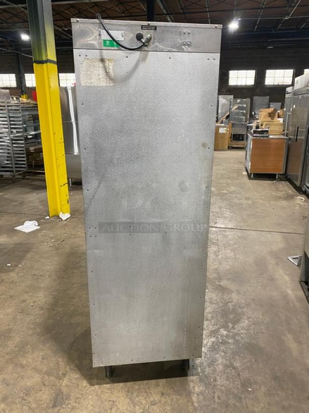 Alto-Shaam commercial stainless steel heated holding/proofing cabinet with dual compartments and Dutch doors, shown on casters.