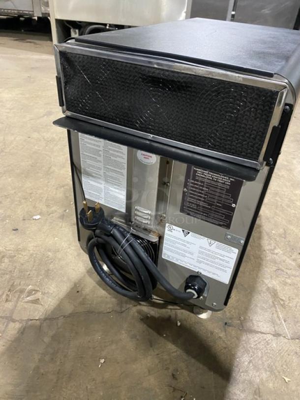 TurboChef NGO countertop oven, 2021 model, black, electric, ventless rapid cook. Features 208/240V, 1 phase, crank bar.