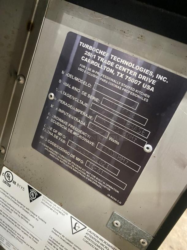 TurboChef NGO ventless rapid cook oven, 2021 model, black, electric, on legs, serial NGOTD44452, 208/240V, with crank bar.