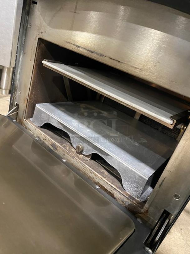 TurboChef NGO ventless rapid cook oven, electric, countertop model, crank bar, black, late 2021, interior view, on legs.