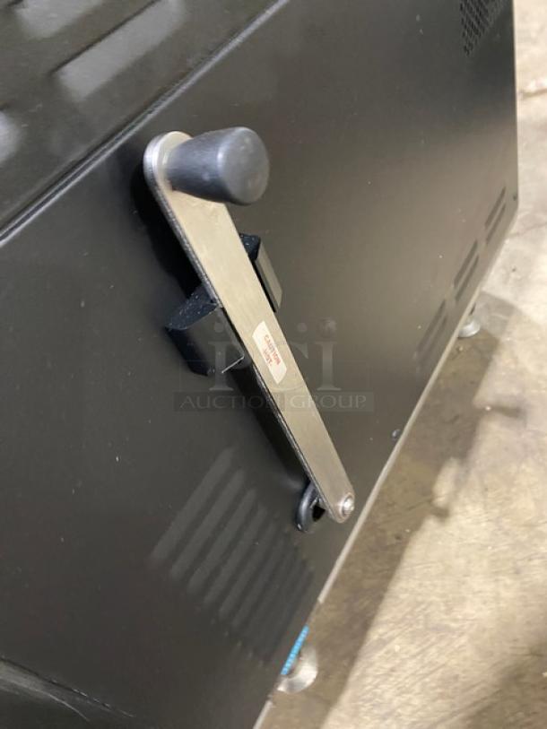 TurboChef NGO 2021 black ventless rapid cook oven, featuring a crank bar, electric powered, on legs. Model NGOTD44452.