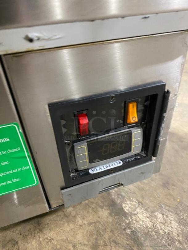 Kinco CNZ90CM refrigerated bakery display case close-up showing control panel with switches and digital display. Model label visible.