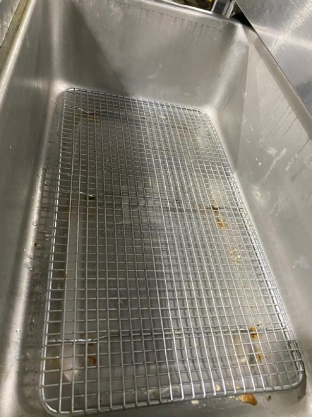 APW Wyott HDD3 heated holding drawer interior with wire rack. Stainless steel. Used condition. Model: HDD-3, 120V, 1 Phase.