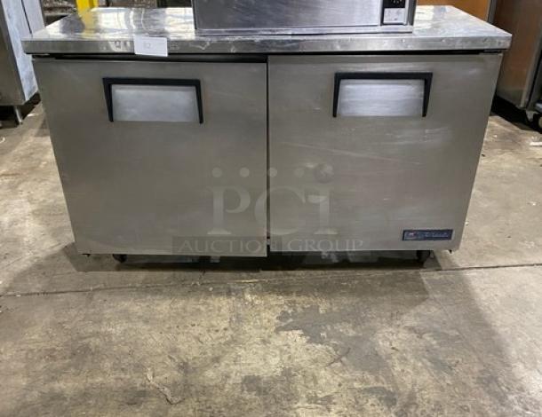 True TUC-60 stainless steel undercounter refrigerator, 2 doors, 60" worktop, on casters, excellent condition.