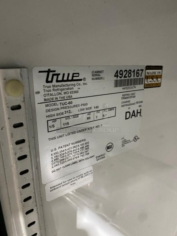 True TUC-60 stainless steel 2-door undercounter refrigerator, serial 4928167, 115V, on casters, made in USA, NSF certified.