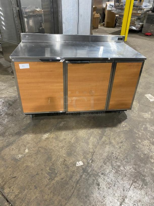 Duke stainless steel worktop refrigerator, model RBC60M, 2-door, 60", up-turned backsplash, on legs, used condition.