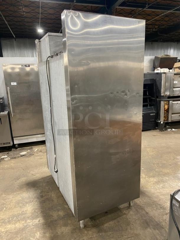 Traulsen commercial stainless steel 4-door refrigerator, model AHT232NUT, SN 2277915K, with built-in pan slides, on legs.