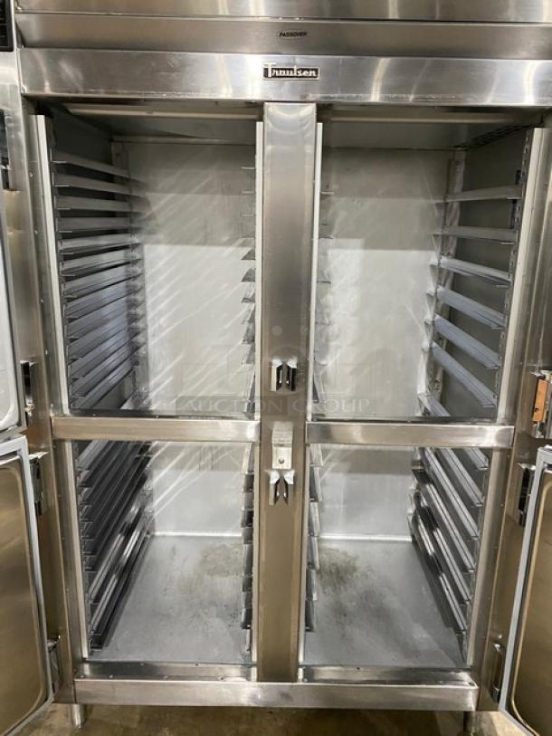 Traulsen AHT232NUT stainless steel 4-door reach-in refrigerator with built-in pan slides, in good condition.