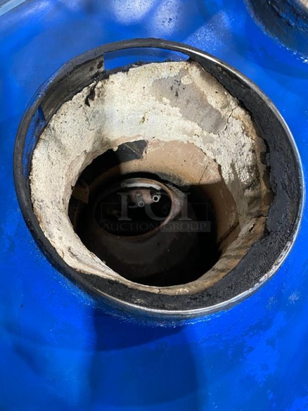 Commercial stainless steel gas-powered 2-burner Chinese wok range with backsplash, dual swivel spout faucet, and sturdy legs.