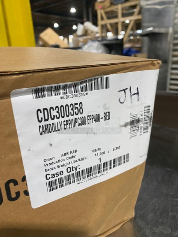 NEW Cambro Camdolly Model CDC300358, heavy-duty, hot red, compact, on casters, ABS material, labeled box included.