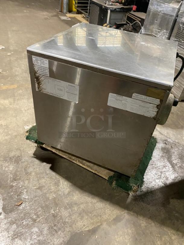 MerryChef Eikon E4 commercial stainless steel turbo oven, electric, countertop model, visible wear with tagged side panel.