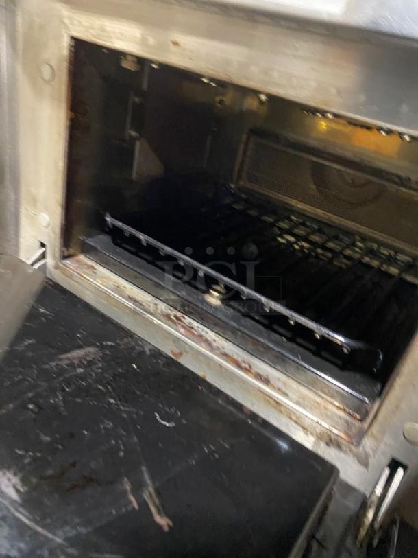 MerryChef Eikon E4 high-speed turbo oven with wired rack, stainless steel, electric, 208/240V, model SN: 1212213090221, commercial use.