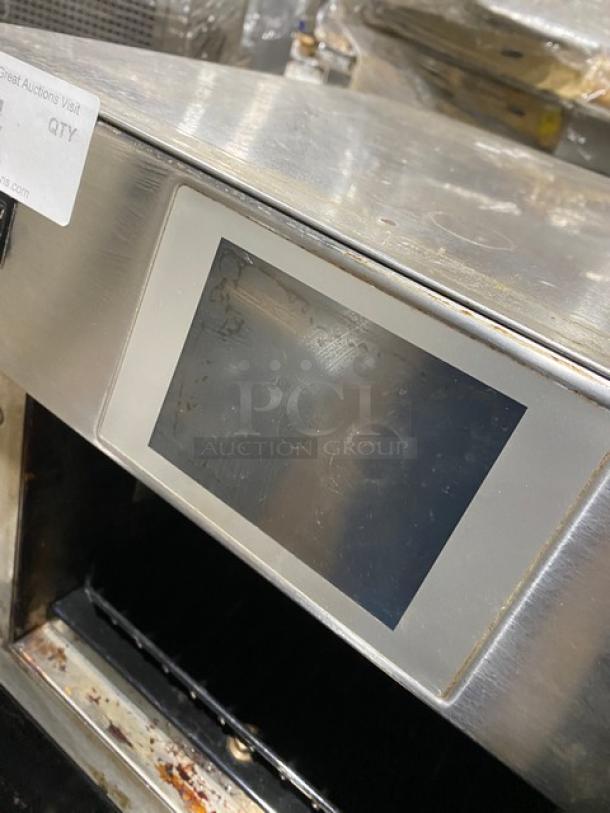 MerryChef Eikon E4 stainless steel rapid cook oven, includes wired rack, 208/240V, used condition, model label visible.