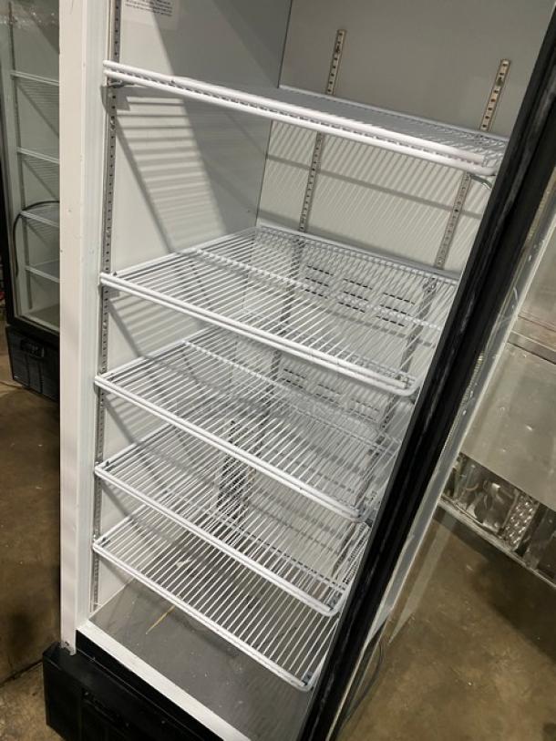 Habco SE18 commercial refrigerator with black single glass swing door, featuring poly-coated wired racks, 115V, in good condition.