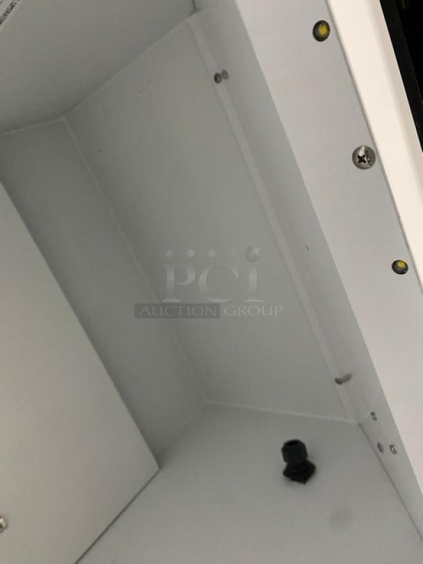 Habco SE18 refrigerator interior view, white finish, visible hardware, poly-coated wired rack not shown.