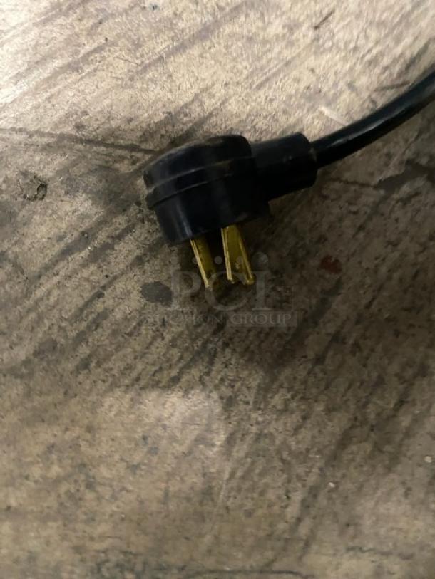 Black power plug for Habco Commercial Refrigerator Model SE18.