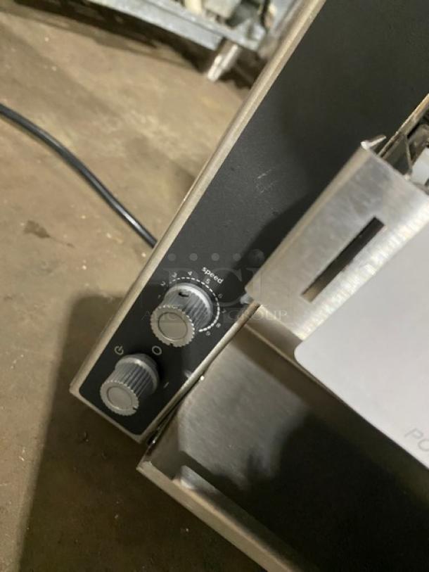 Vollrath JT1 stainless steel countertop conveyor toaster, speed and heat dials visible, model tag with SN: P162-01873337-014.