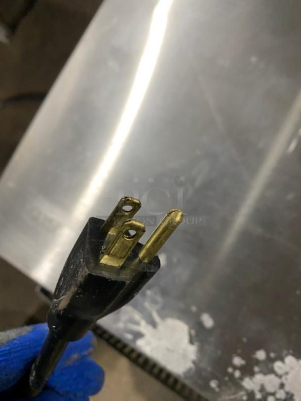 Vollrath JT1 stainless steel countertop bread conveyor toaster, electric, 120V, on legs, condition unknown.