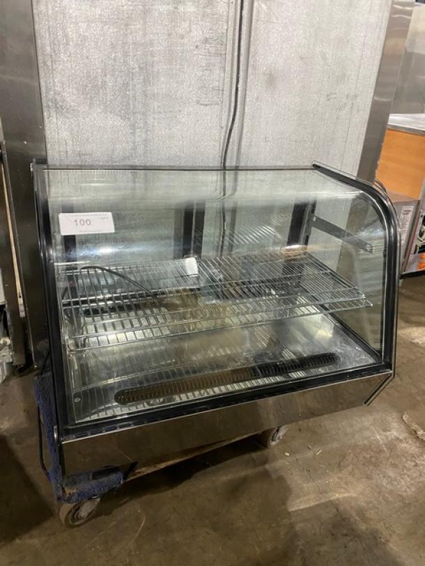 Marchia MDC161 stainless steel 36" curved glass bakery display case, adjustable chrome rack, LED lighting, rear sliding door.