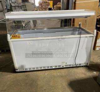Vendo NIC183S02 white 72" open-air freezer with sneeze guard and LED lighting. Used condition. Serial: 000149903. 220V, 1 phase.