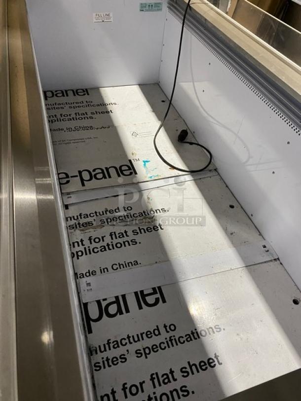 Vendo NIC183S02 72" ice cream cabinet with sneeze guard and LED lighting. Features a single shelf, visible wiring, and branding details.