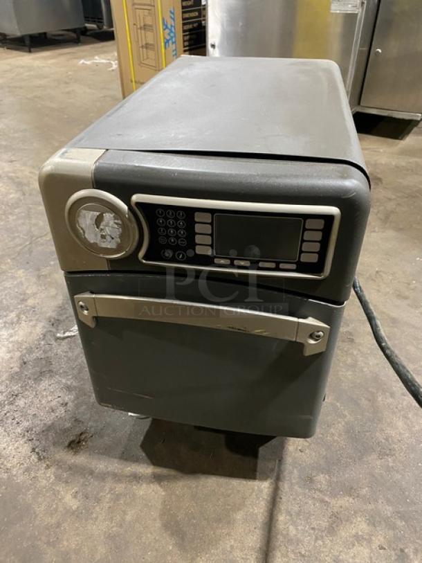 2017 Turbo Chef NGO countertop rapid cook oven, slight wear, digital keypad, visible damage on the front control panel.