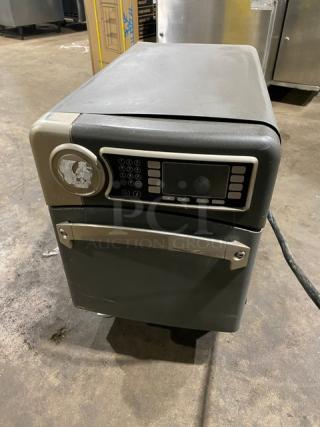 2017 Turbo Chef NGO countertop rapid cook oven, slight wear, digital keypad, visible damage on the front control panel.