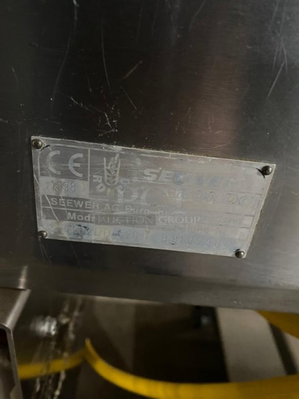 Rondo floor-style belt conveyor system, metal construction, visible label with model I72DU-20, dated 1998.