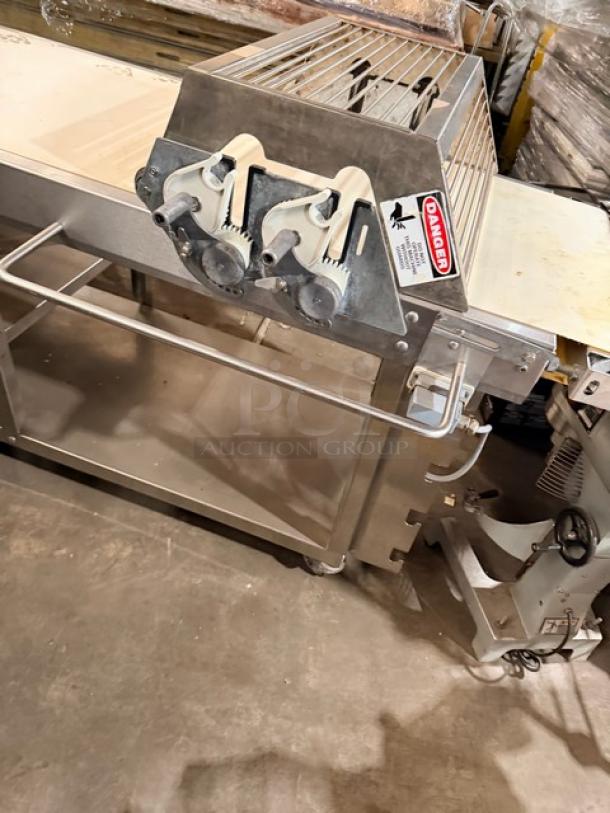 Seewer Rondo Floor Style Belt Conveyor System, Model SBEVERR, Serial B8102304, on casters, stainless steel structure.