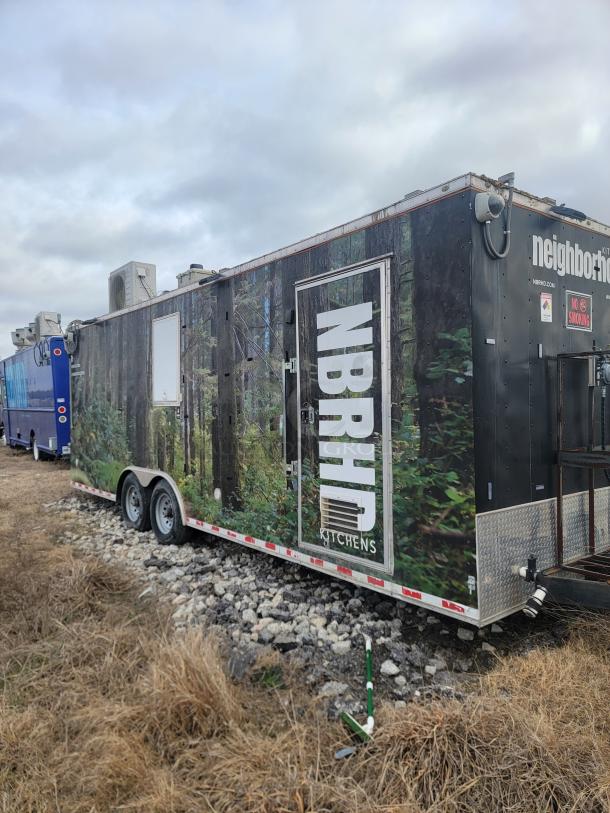 24' Diamond Cargo mobile kitchen trailer, forest wrap, 2021 model, 14,000 lbs GVWR, "NBRHD Kitchens" branding, no-smoking sign.