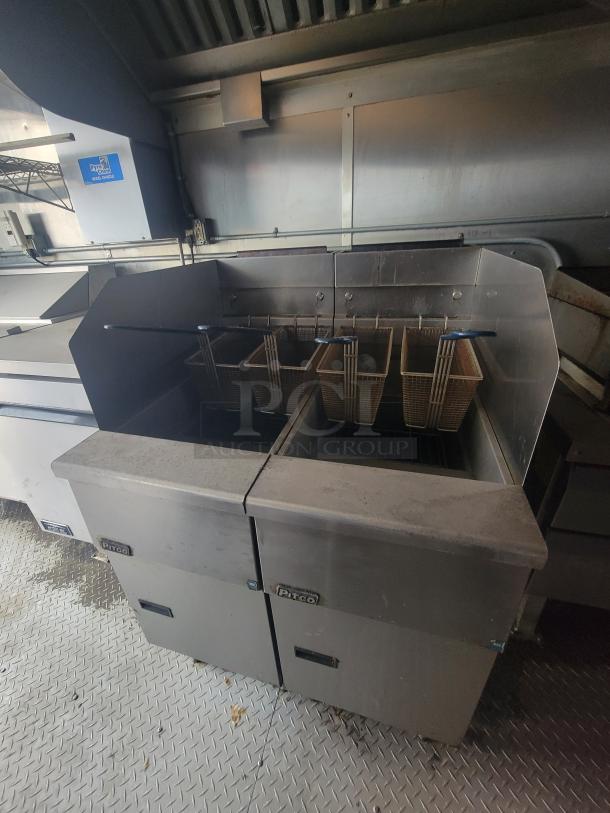 Fully equipped 24' Diamond Cargo mobile kitchen trailer, 2021 model. Features Pitco fryers, professional wrap for high-volume use.