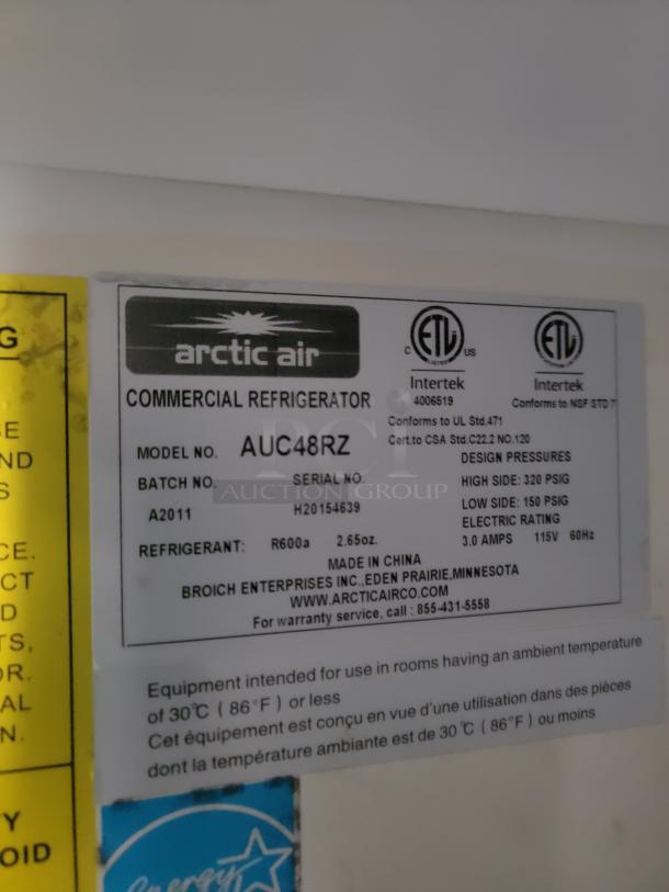 Arctic Air commercial refrigerator label, model AUC48RZ, R600a refrigerant, design pressure 320 PSIG, 115V, 60Hz.