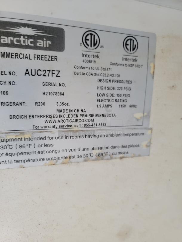 Label on Arctic Air commercial freezer, Model: AUC27FZ. Features R290 refrigerant, 115V, 1.9 amps. Made in China.