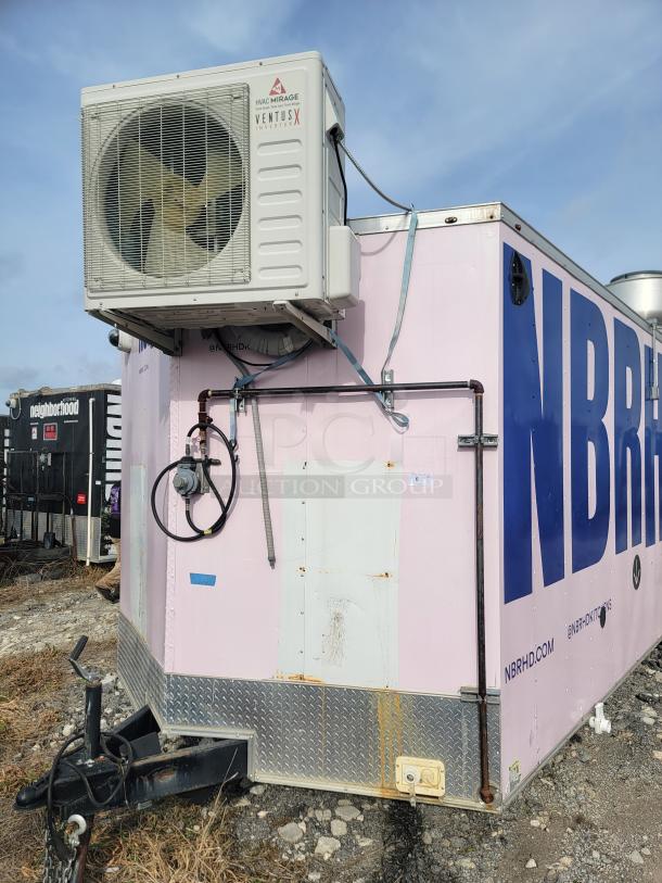 24' Haulmark mobile kitchen trailer by NBRHD Kitchens, featuring Mirage HVAC unit. Professional setup for high-volume service.