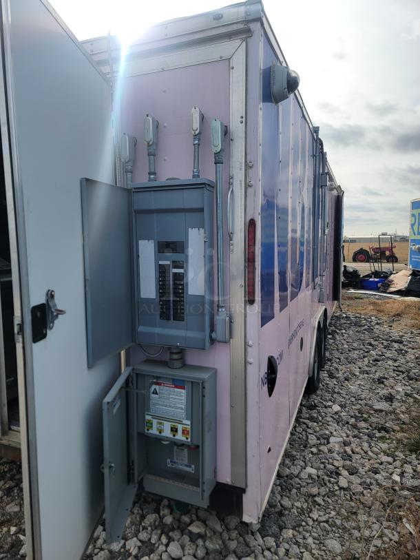 Fully Loaded 24' Mobile Kitchen trailer by Haulmark with NBRHD Kitchens build, features commercial refrigeration and climate control.