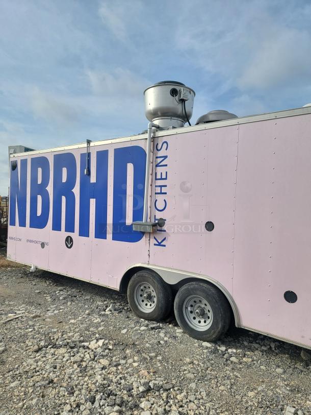 24' Haulmark mobile kitchen trailer, NBRHD Kitchens branding, equipped with commercial refrigeration and fire suppression systems.