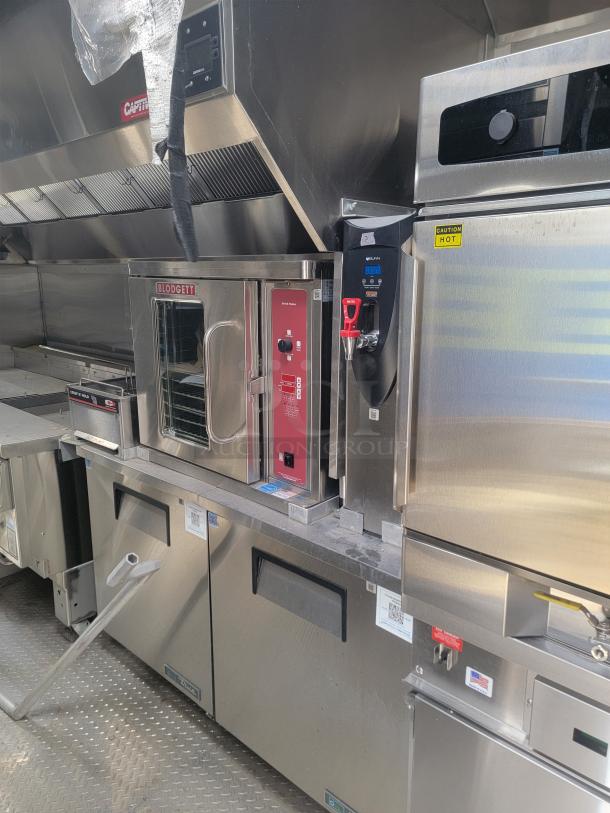 2021 Texino FD-306 mobile kitchen interior with Blodgett oven, Winston CVap retherm, True refrigeration. Needs cleaning.