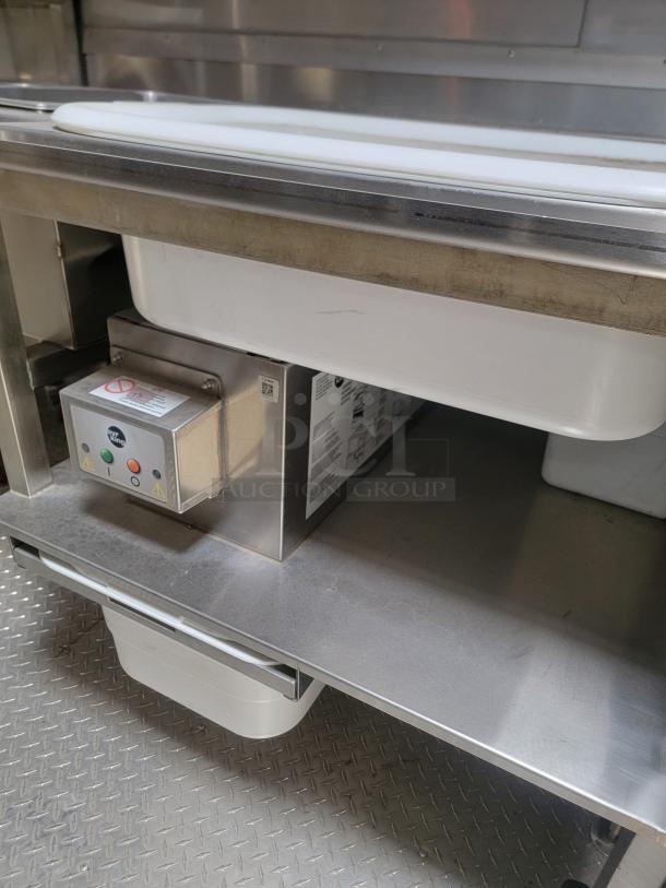 2021 Texino FD-306 mobile kitchen interior, showing stainless steel counter and commercial equipment, needs cleaning.