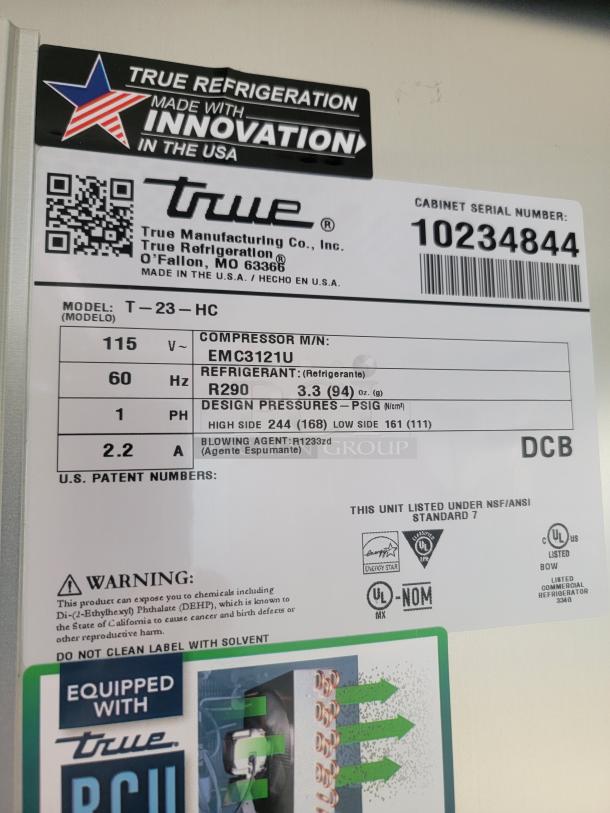 Label on True refrigeration unit showing model T-23-HC, 115V, using R290 refrigerant. Serial number: 10234844.