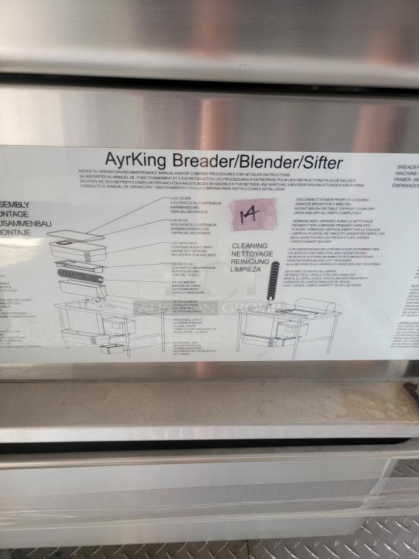 AyrKing Breader/Blender/Sifter instruction label on stainless steel surface. Visible cleaning and assembly diagrams. Marked with "14."