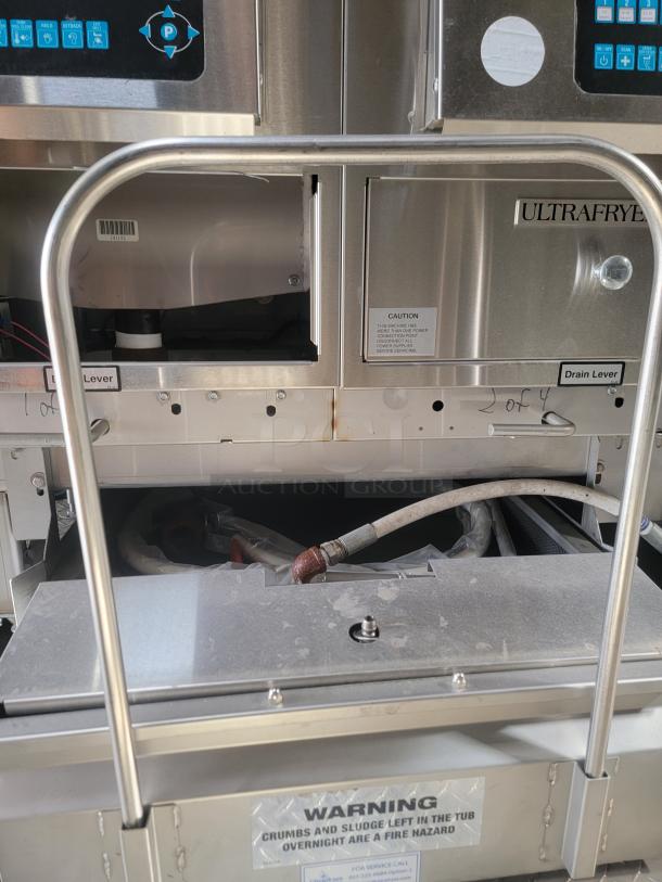 2021 Texino FD-306 mobile kitchen equipment; stainless steel UltraFryer, caution and warning labels visible.